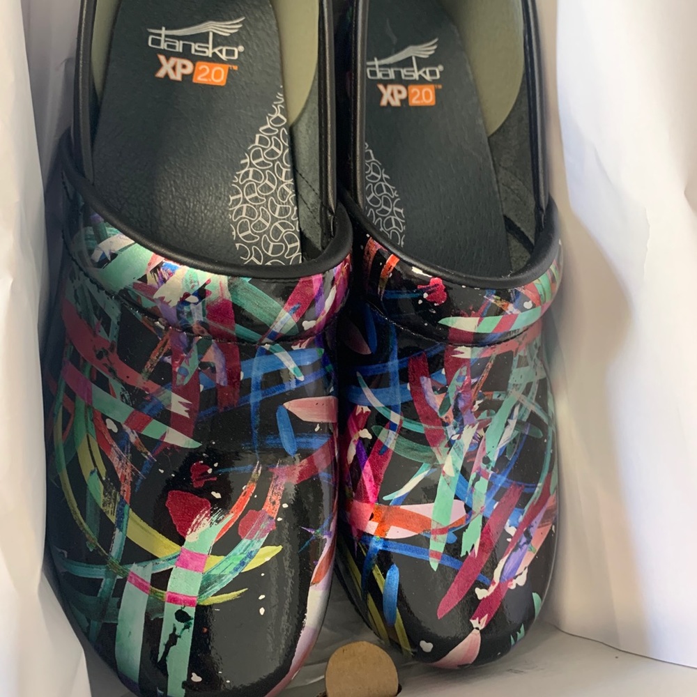 SOLD- Dansko clogs never used. Size 10